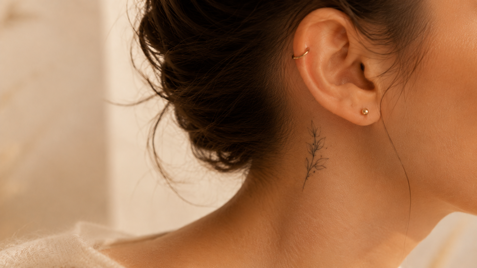 Alt text : Ear curation et tatouage fine line — guide pour planifier l'ordre de ses projets body art